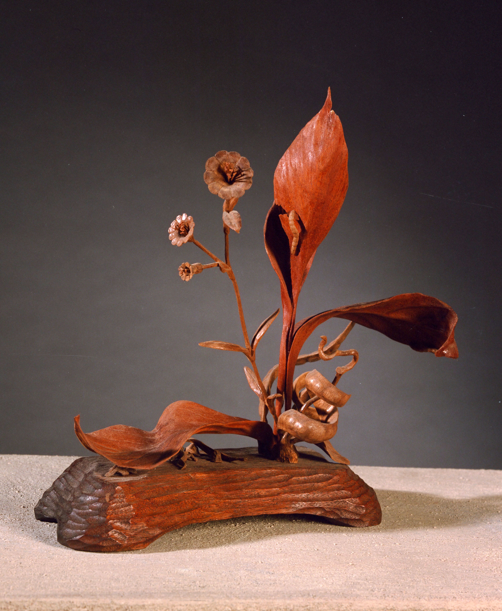 Life sculpture — carved wood flowers and leaves